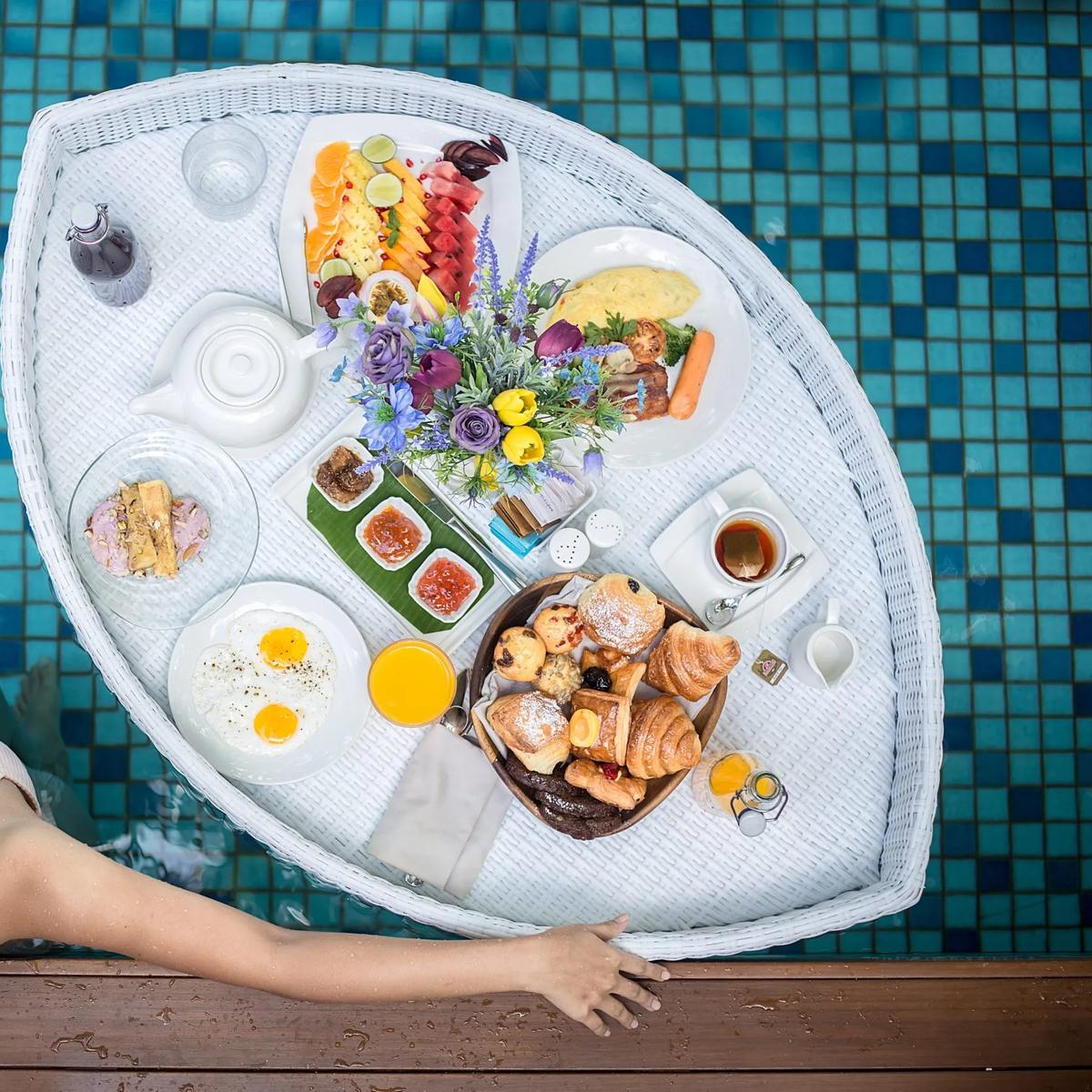 A Floating Breakfast tray in a villa pool at Mercure Maldives Kooddoo Resort