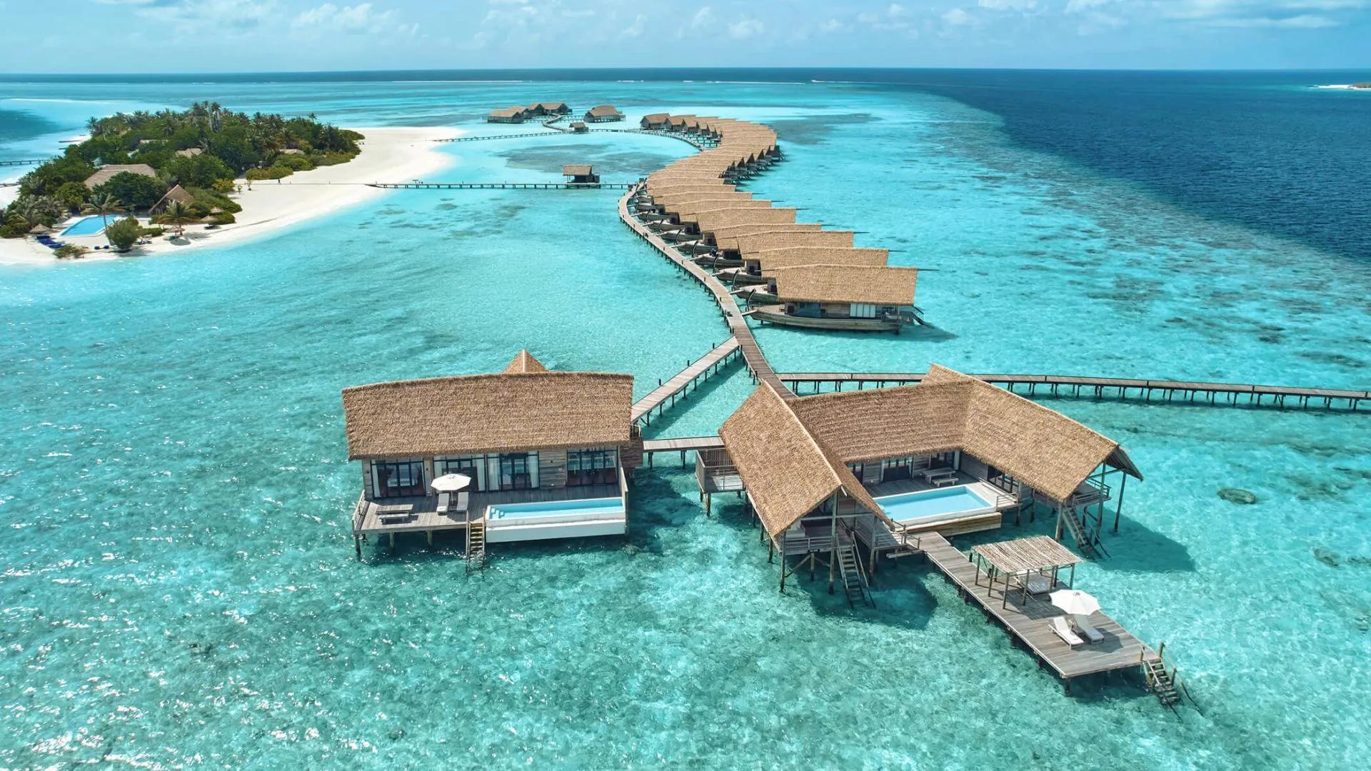 The Three-Bedroom COMO Sunset Villa's two joined wings, each with its own private pool, seen from above