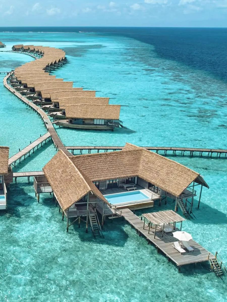 The Three-Bedroom COMO Sunset Villa's two joined wings, each with its own private pool, seen from above