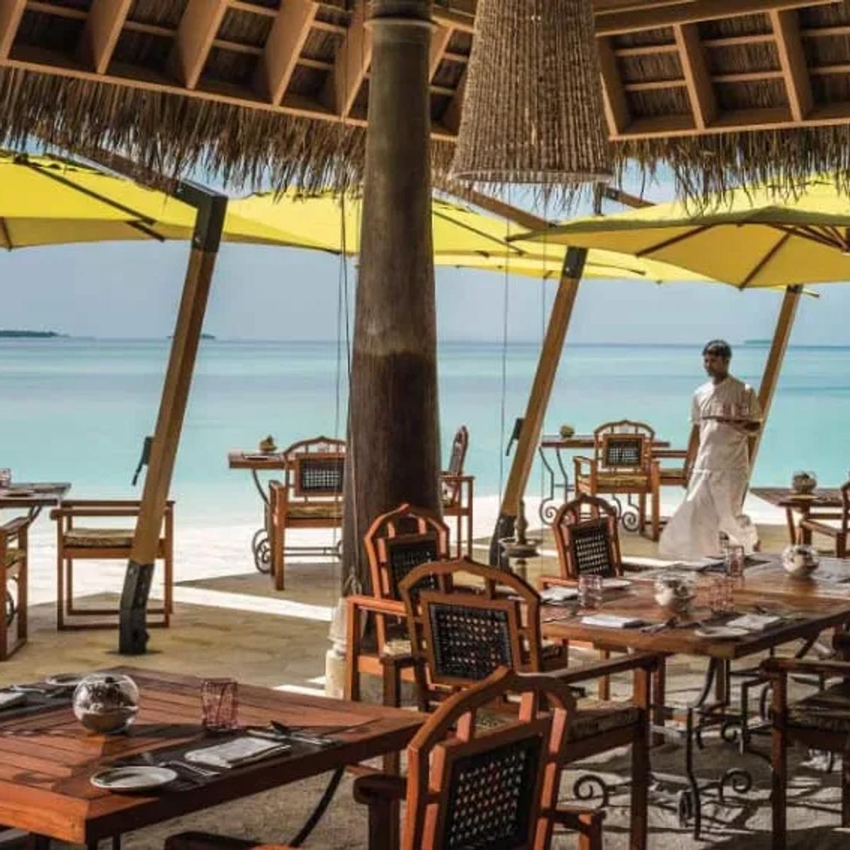 Dining room set-up at PLATES restaurant, Anantara Kihavah Maldives Villas