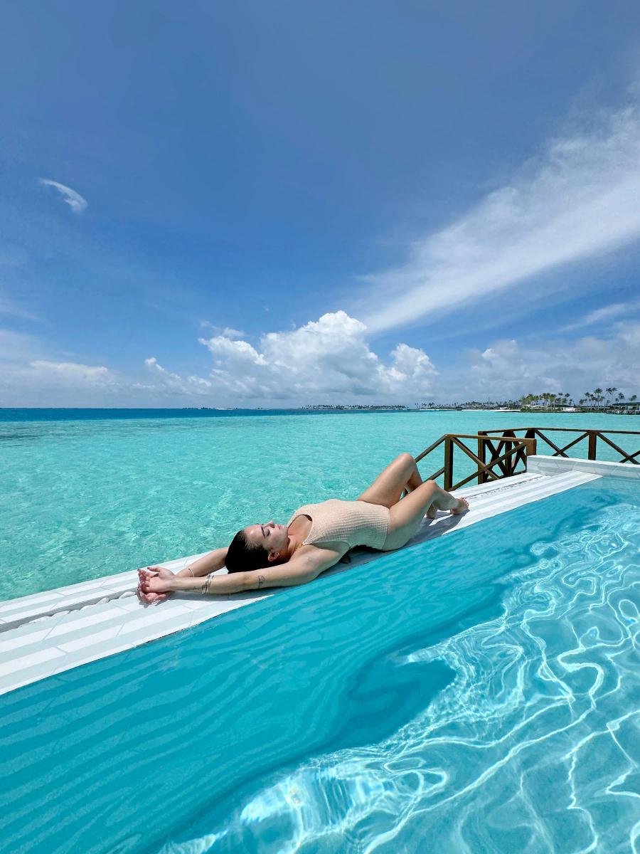 An aerial view of the two-bedroom Lagoon Residence, its private pool and sundeck built into the overwater structure