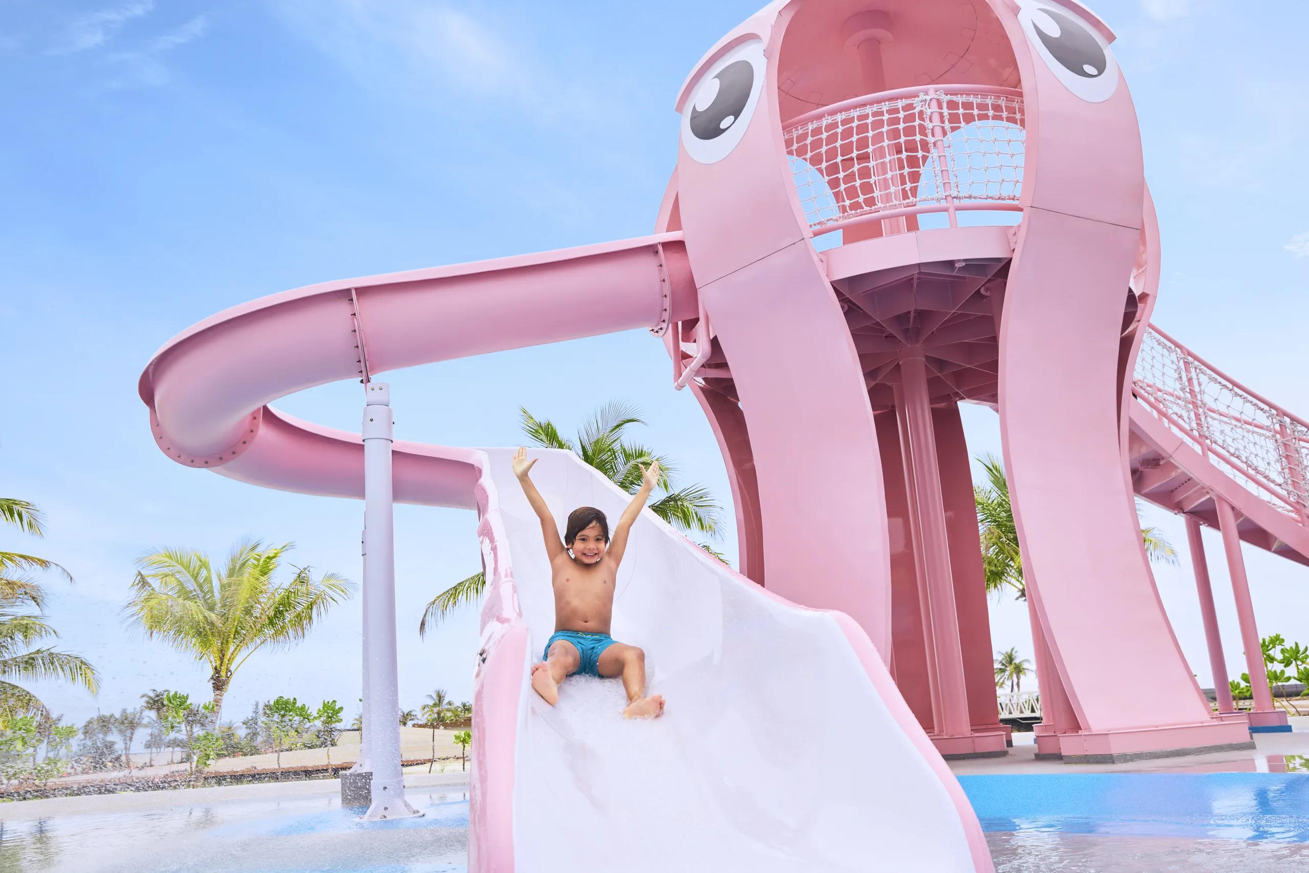 Slides and a water playground inside the resort's outdoor water complex
