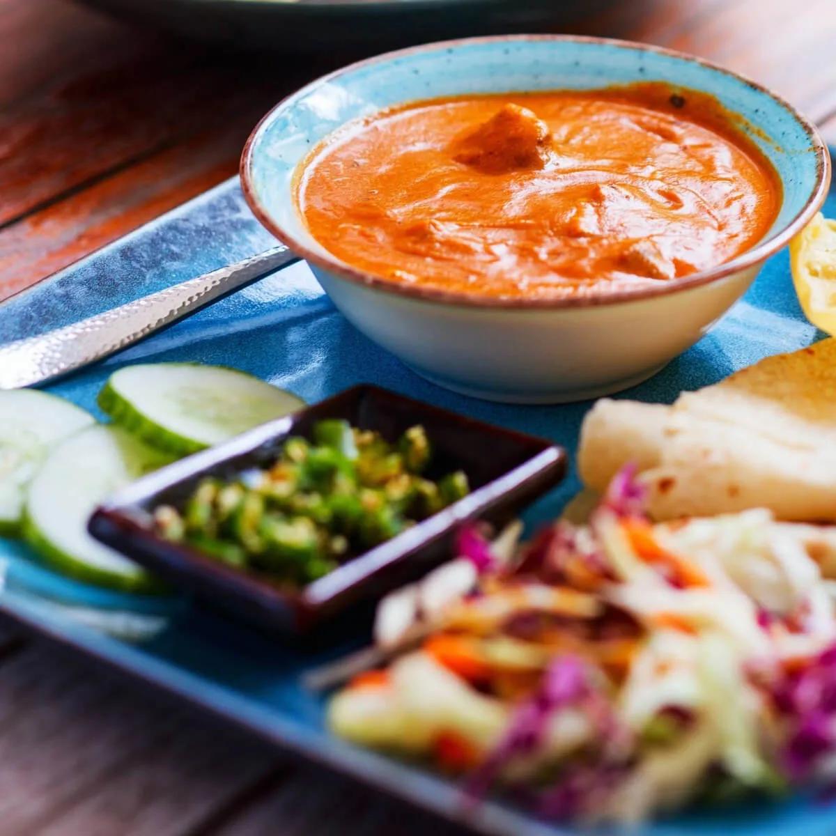 A traditional Maldivian curry plate with roshi and accompaniments, from Malaa's cooking classes