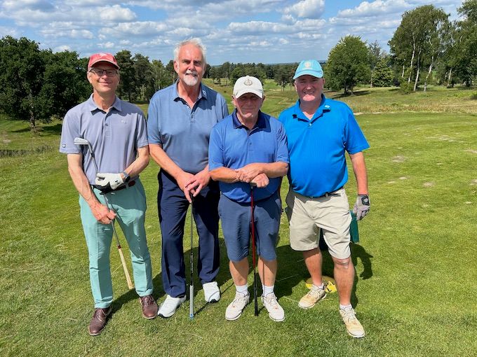 A four-ball ready to go on the heathland turf
