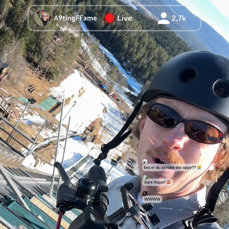 Karateren "A9tingFFame" på toppen av en hoppbakke og tigger for likes.