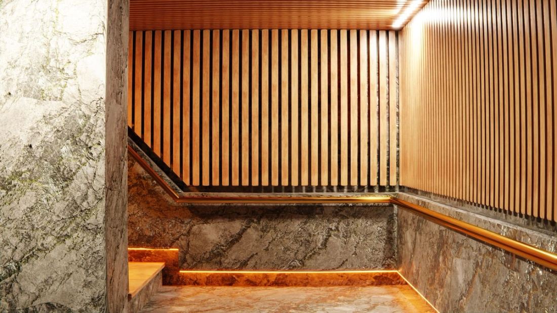 Workspace stair with fluted oak slats and green marble