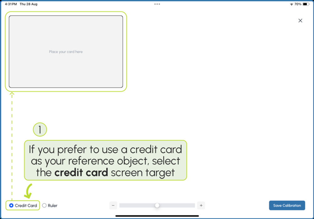Placing a credit card over Eyeli's on-screen calibration target