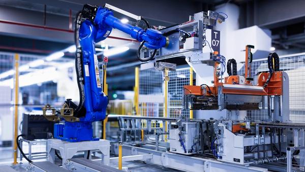Robotic arm in production demonstrating automation solutions