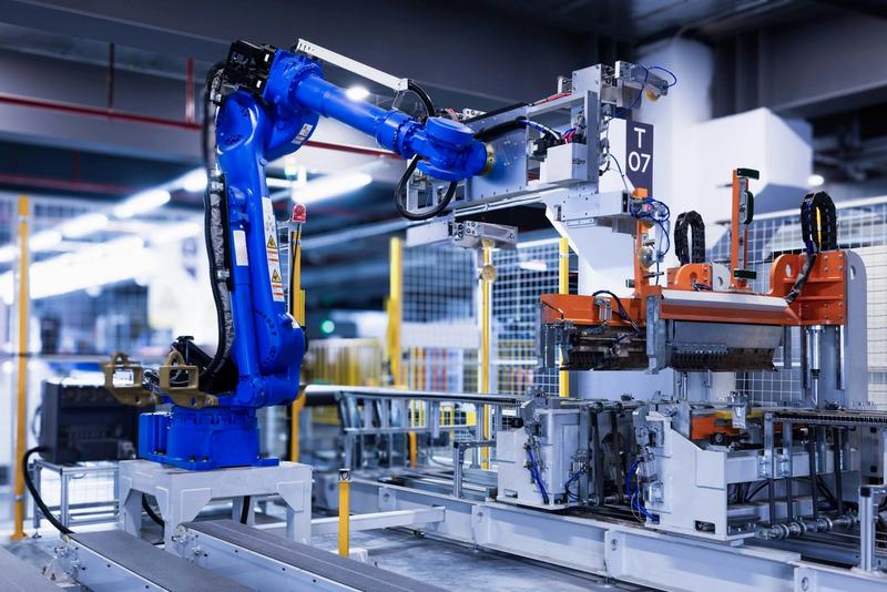 Robotic arm in production demonstrating automation solutions