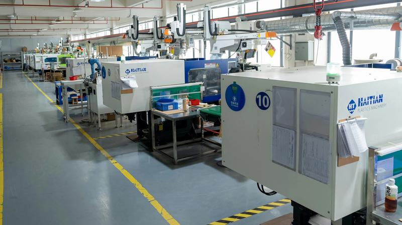 Plastic injection molding machines in production