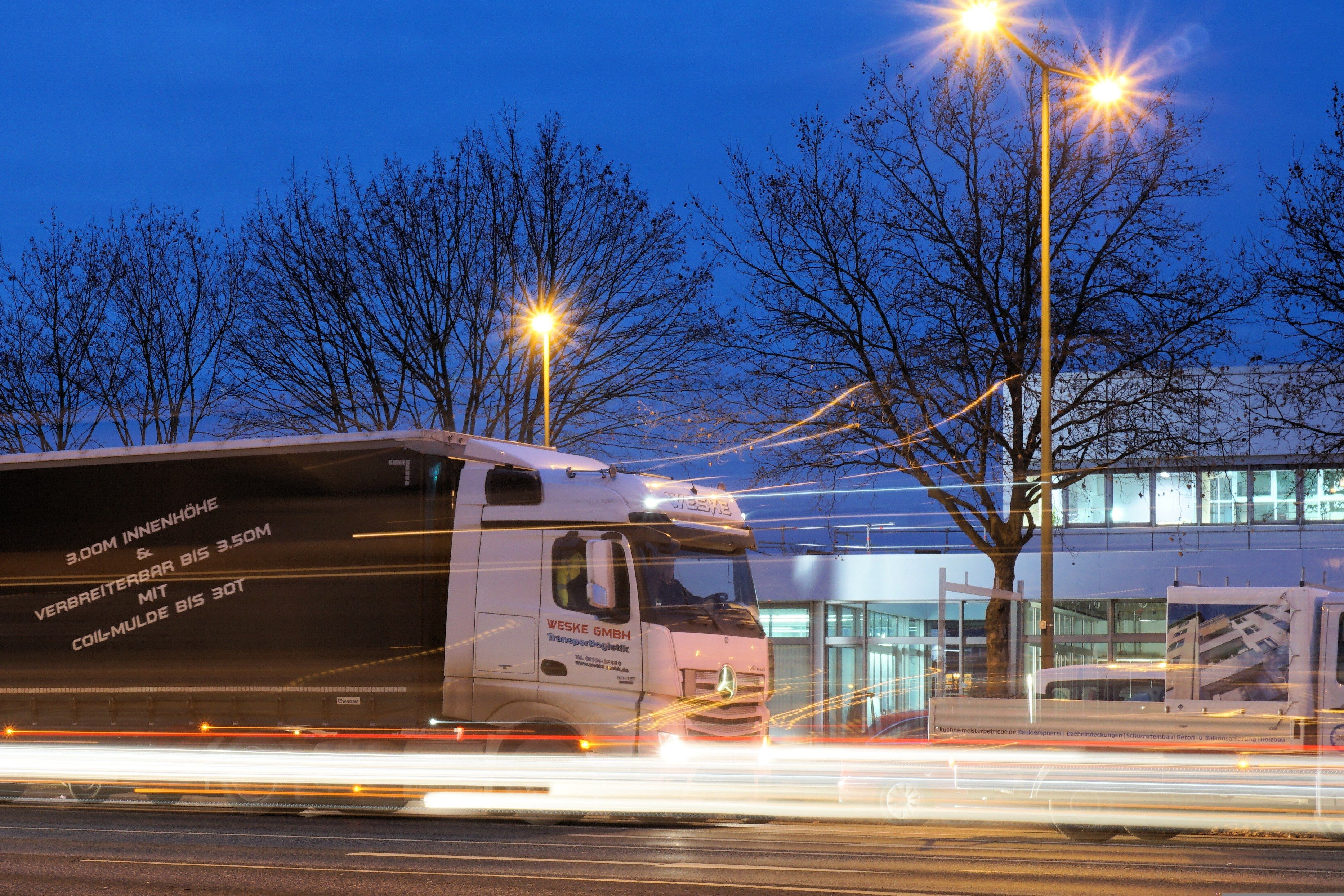 Refrigerated truck on a logistics route at dusk, representing cold chain logistics in Southeast Asia