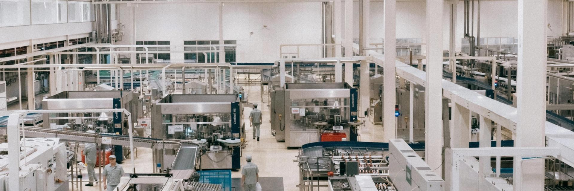 photo of a ready built factory and with factory workers