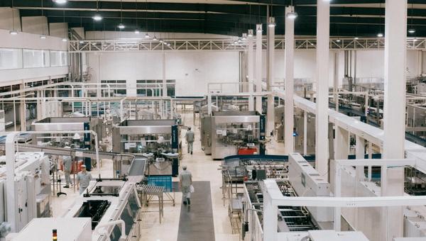 photo of a ready built factory and with factory workers