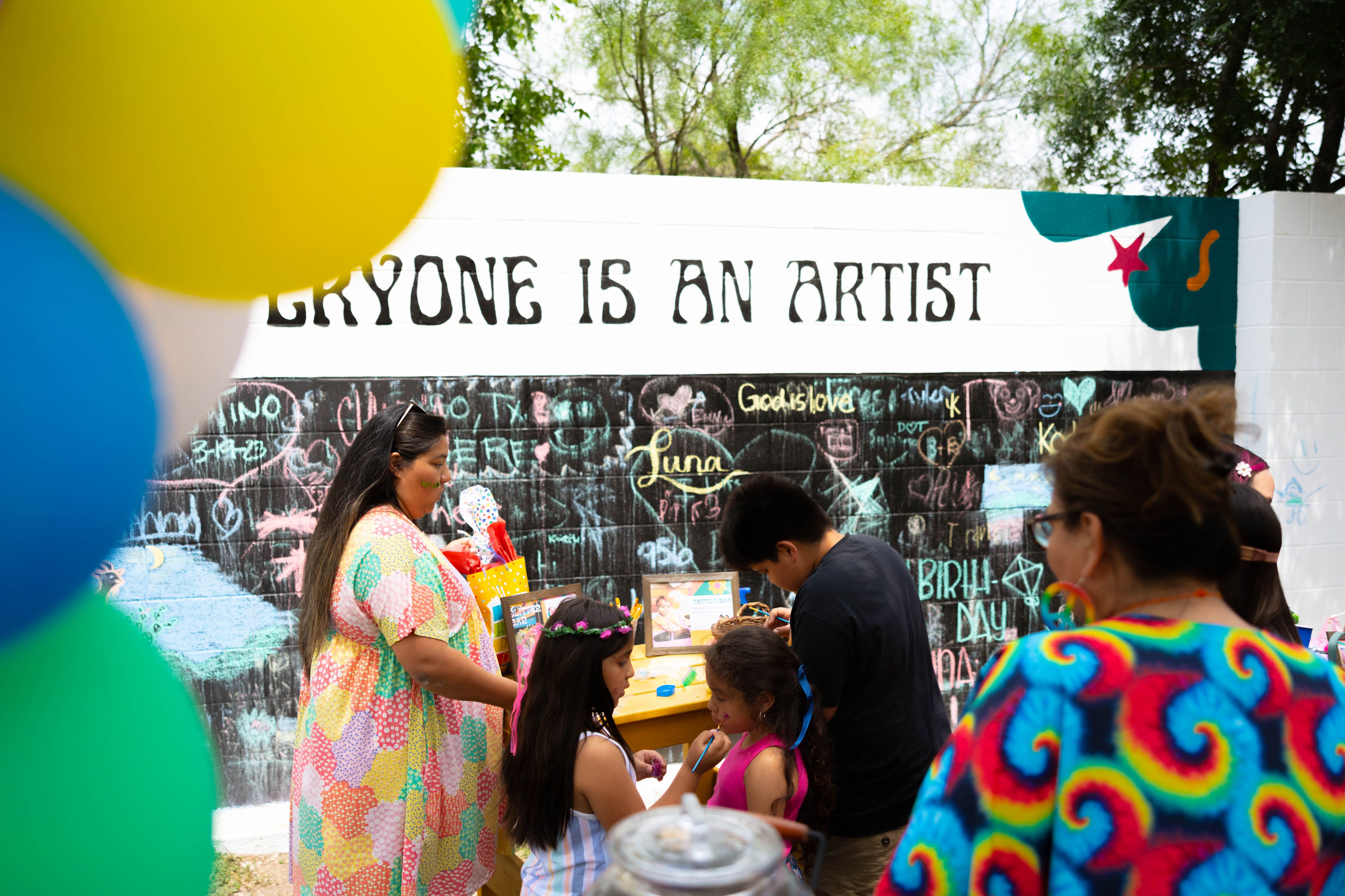 People attending a birthday party at The Inn Between in Concan, Texas