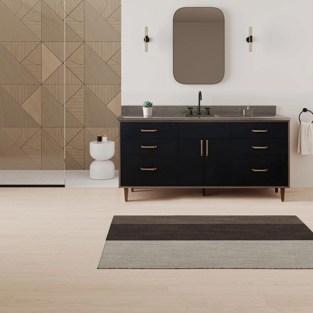 Black single vanity with a geometric oak wall