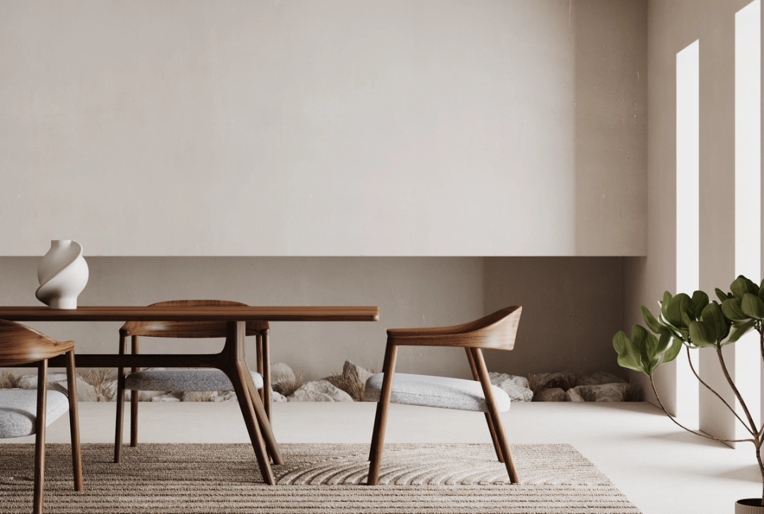 Minimal dining room with a wooden table and chairs