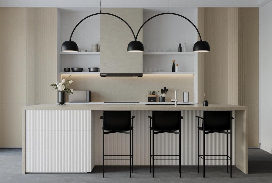 Kitchen with an island, black stools and arched pendant lights