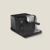 Black Fellow Espresso 1 Series espresso machine on tan background