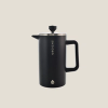 Grosche Brand Black Insulated Stainless Steel French Press on tan background