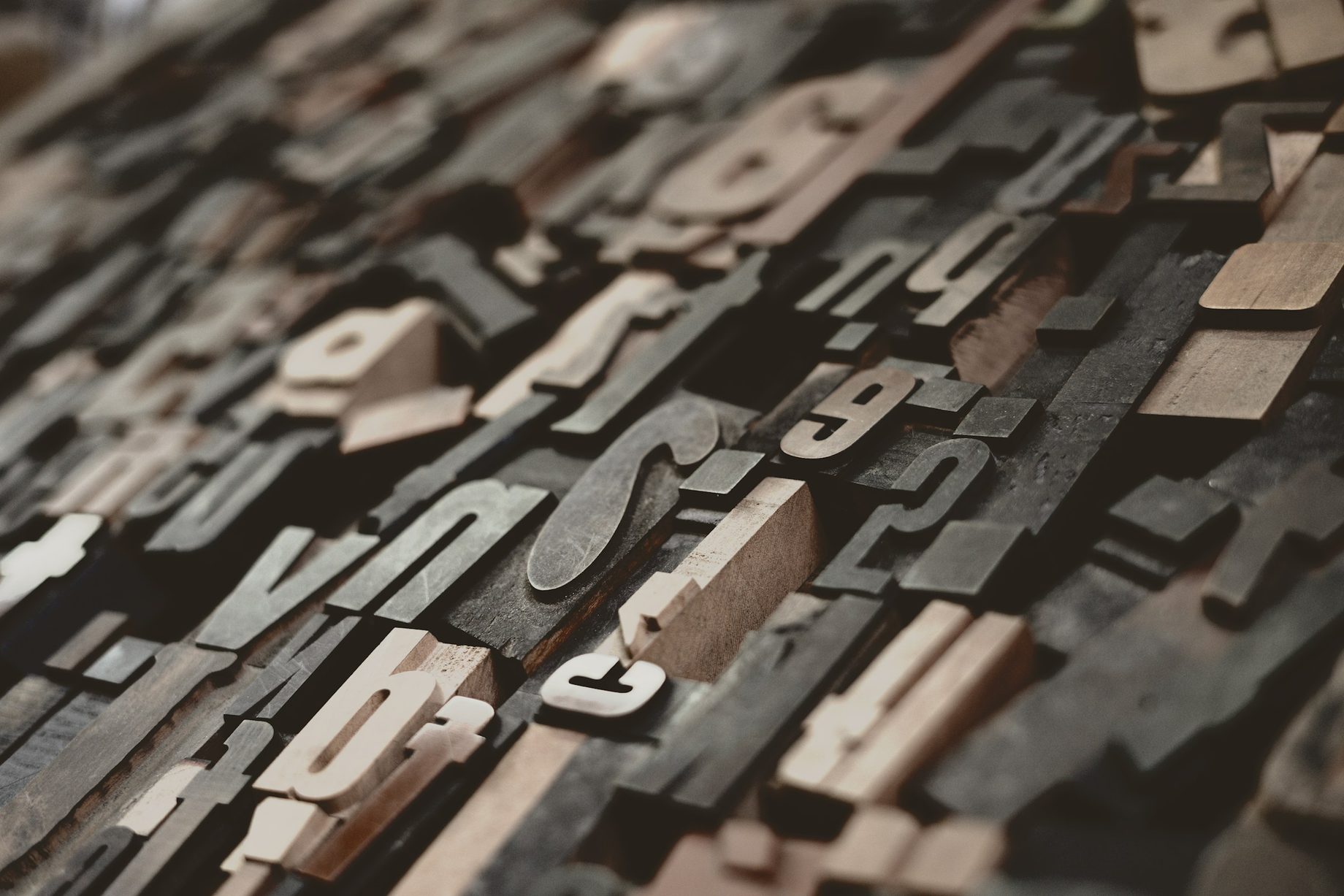 Rows of vintage wooden type blocks