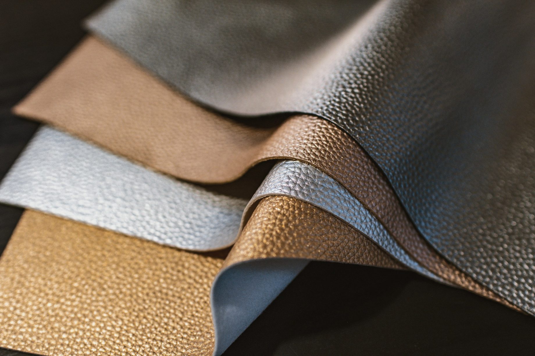 Leather samples in soft neutral tones fanned out