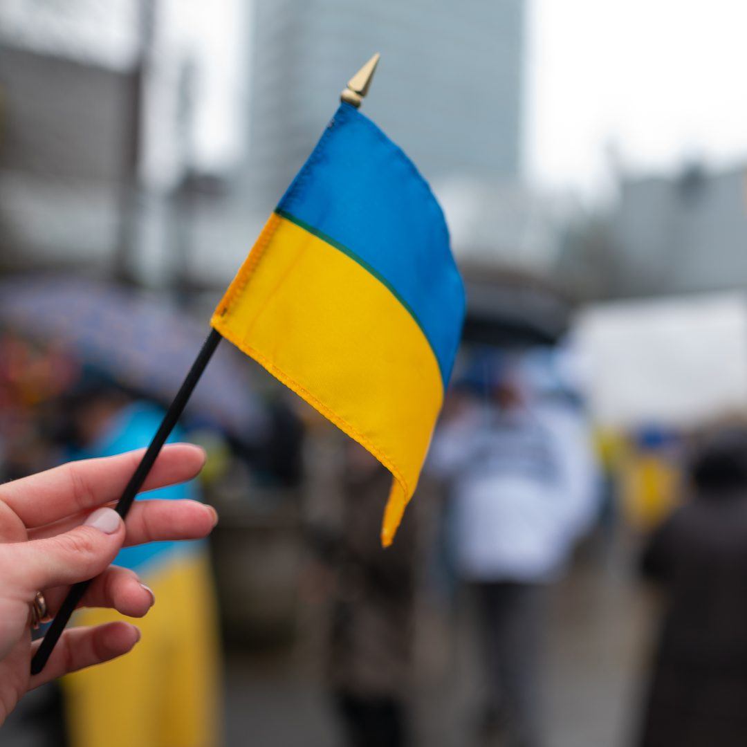 Ukraine flag at a protest|Ukraine flag at a protest