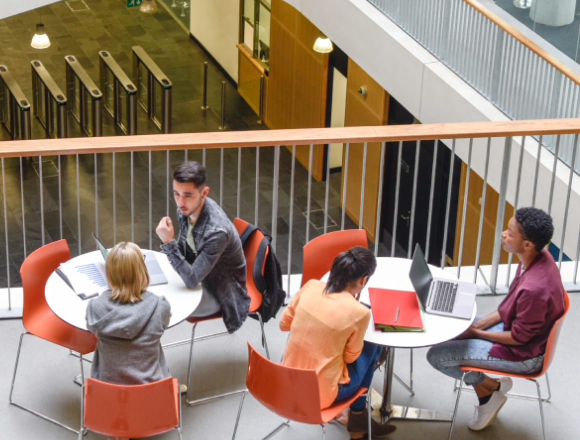 students discussing on break room
