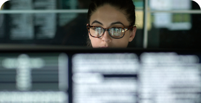 Woman in an office working on her computer