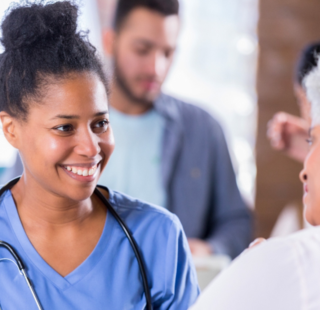 Nurse talking to patient