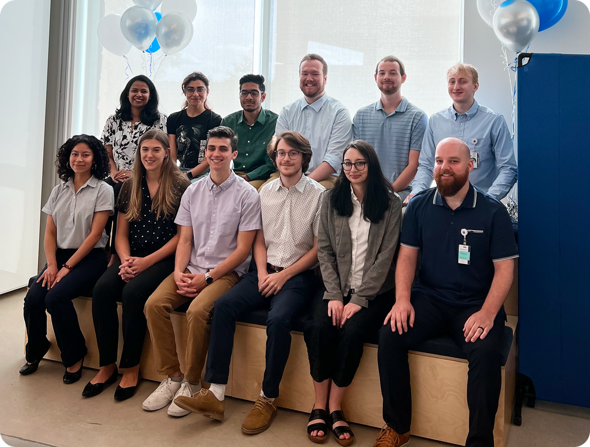 SailPoint intern group photo with balloons