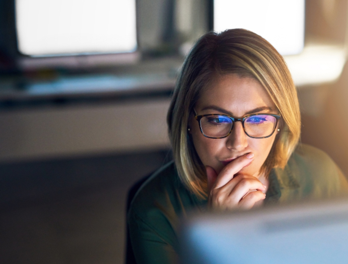 woman thinking while working