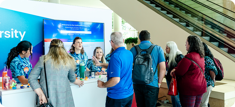 People gathered around a booth