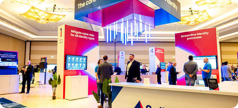 Navigate expo hall that showcases a SailPoint booth