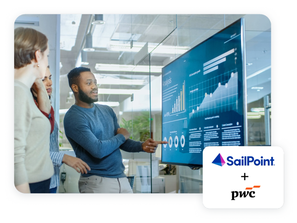 A man gestures at facts and figures on a big television screen while two women look on. Also includes the SailPoint and pwc logos