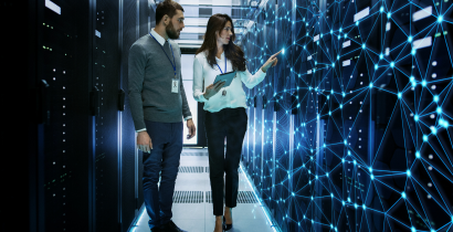 Woman and man in a server room