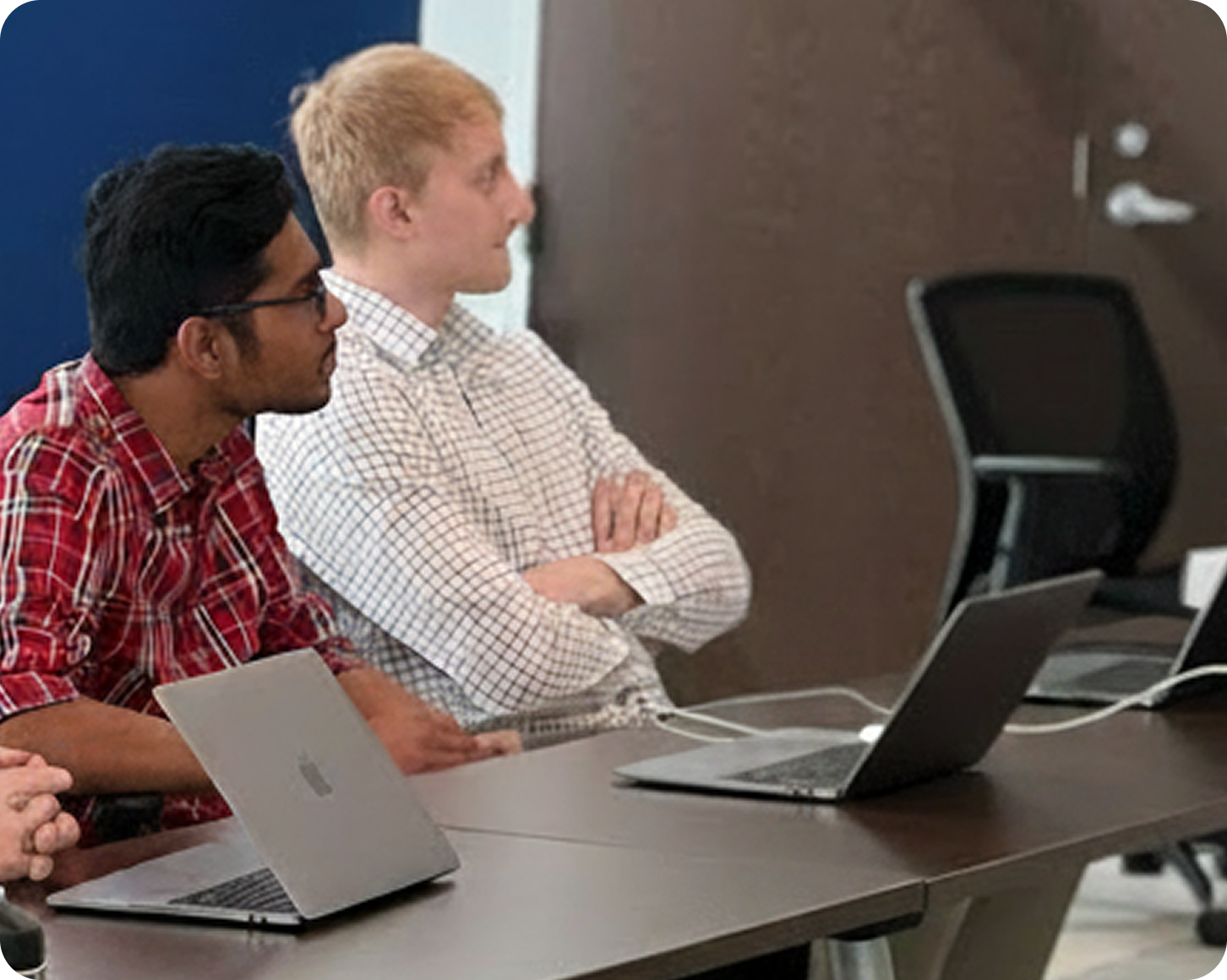 Customer experience interns in a SailPoint meeting