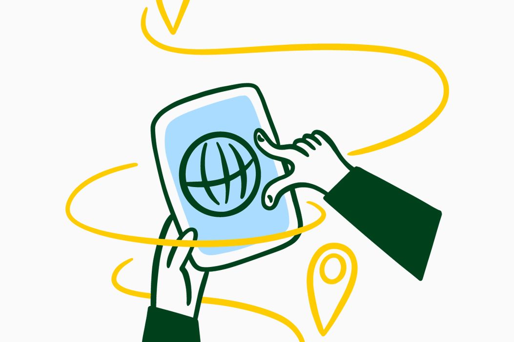 Illustration of two hands holding a tablet with a globe symbol on the screen. Location markers float around the tablet.