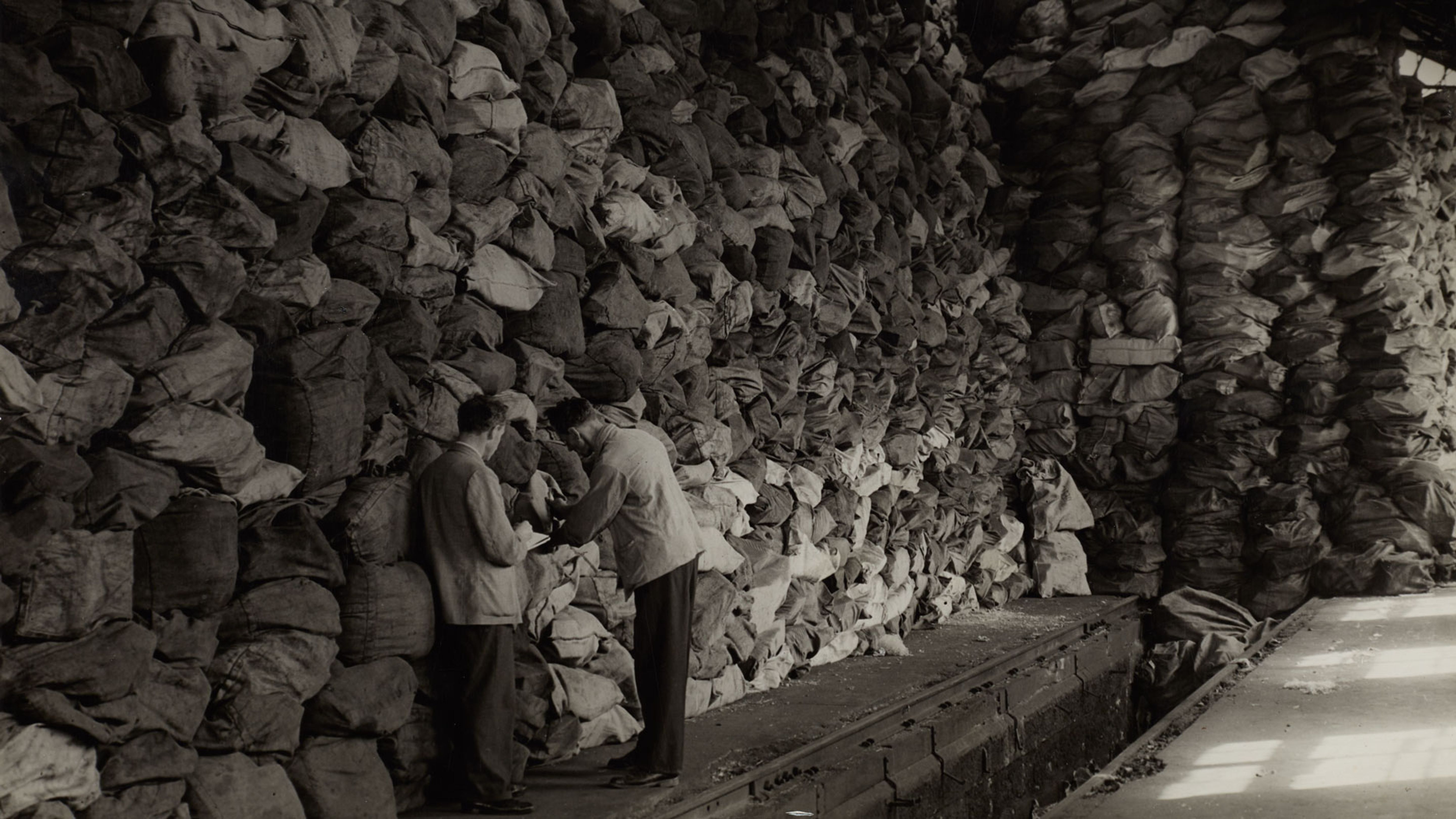 Prisoner-of-war mail in Basel, mail bags piled up for onward transport, circa 1945. Source: Robert Spreng (photographer) / Museum of Communication