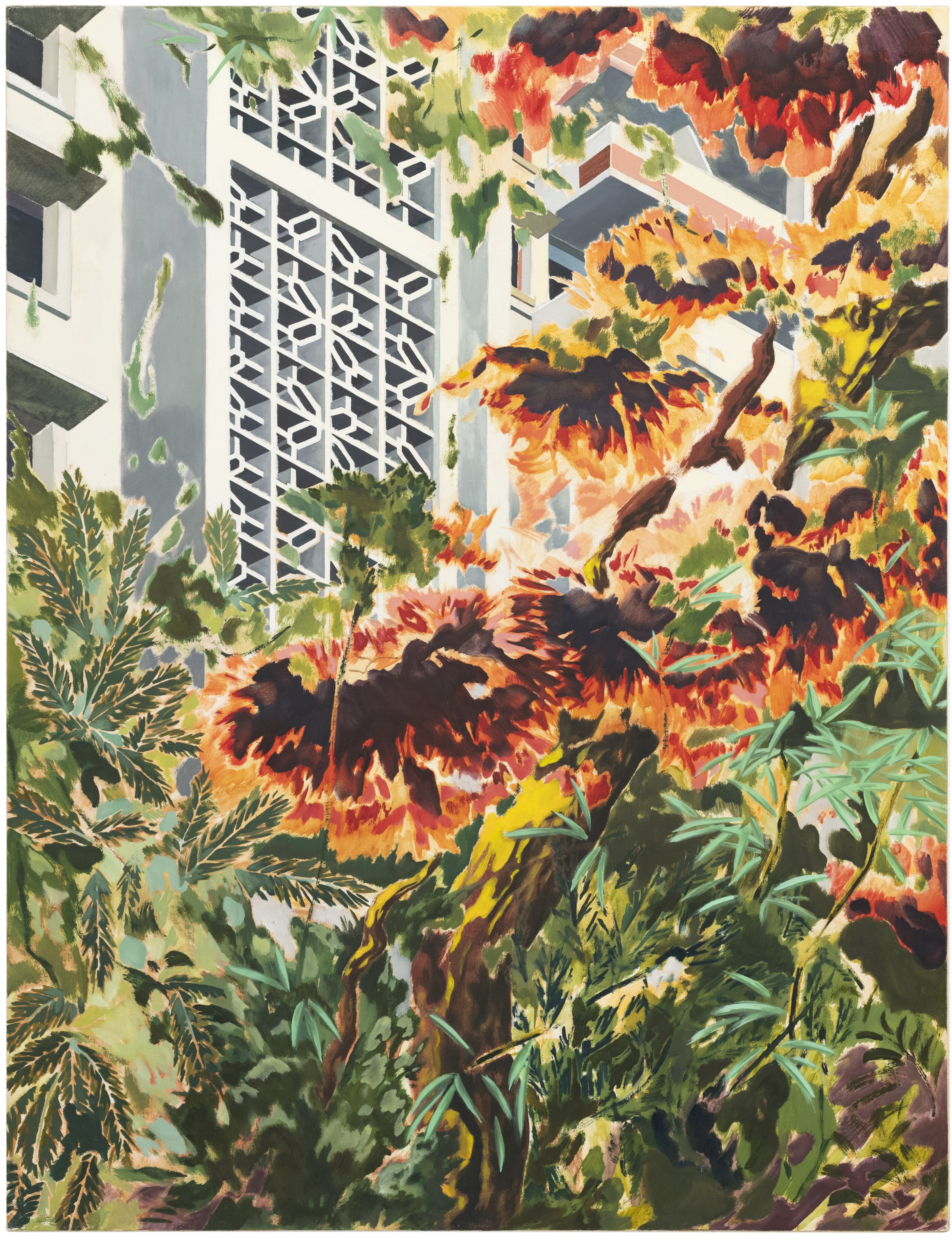 Moderne Architektur hinter bunter Vegetation in einem urbanen Umfeld.
