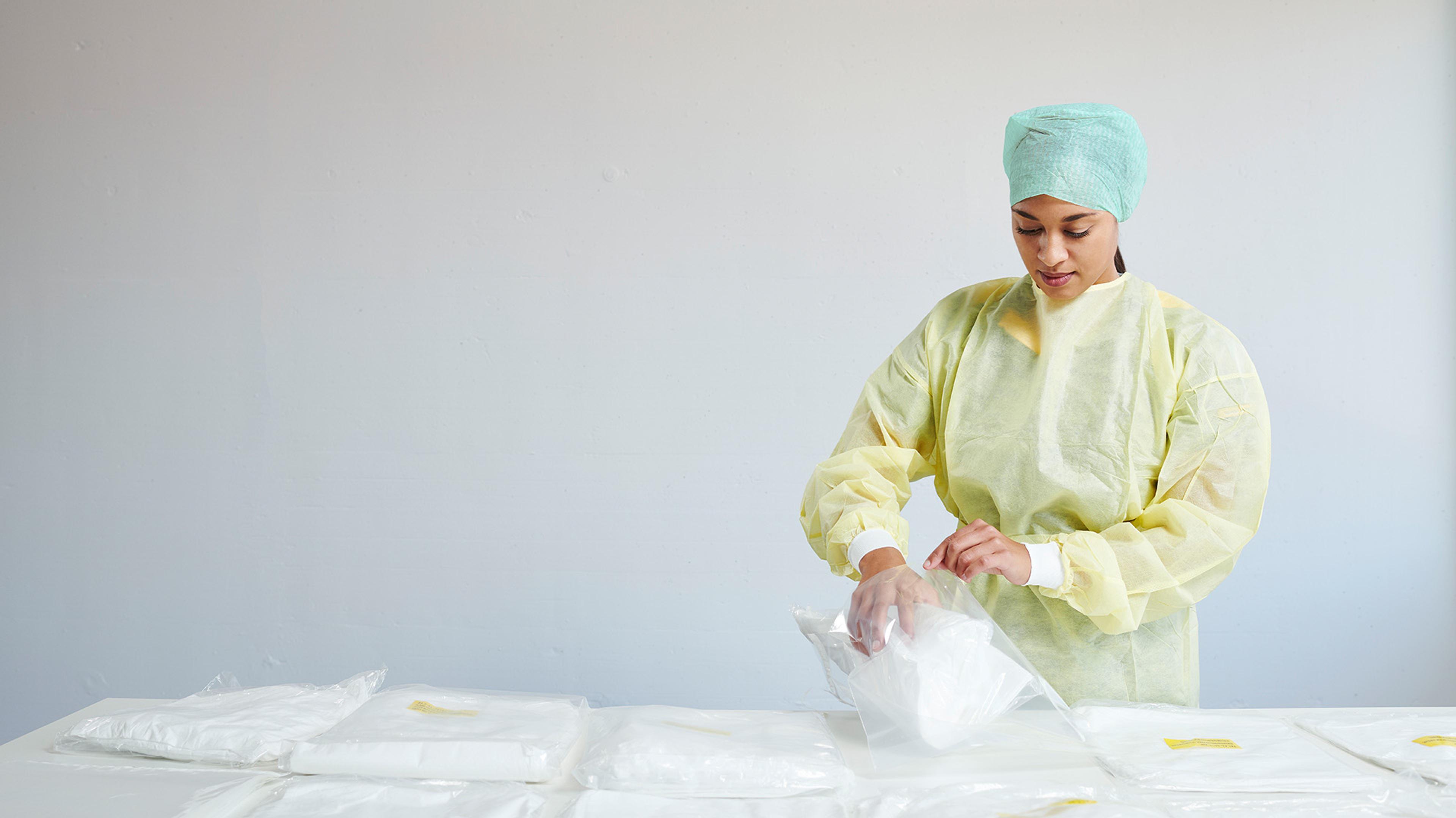 Swiss Post Cargo employee picks pharmaceutical items.