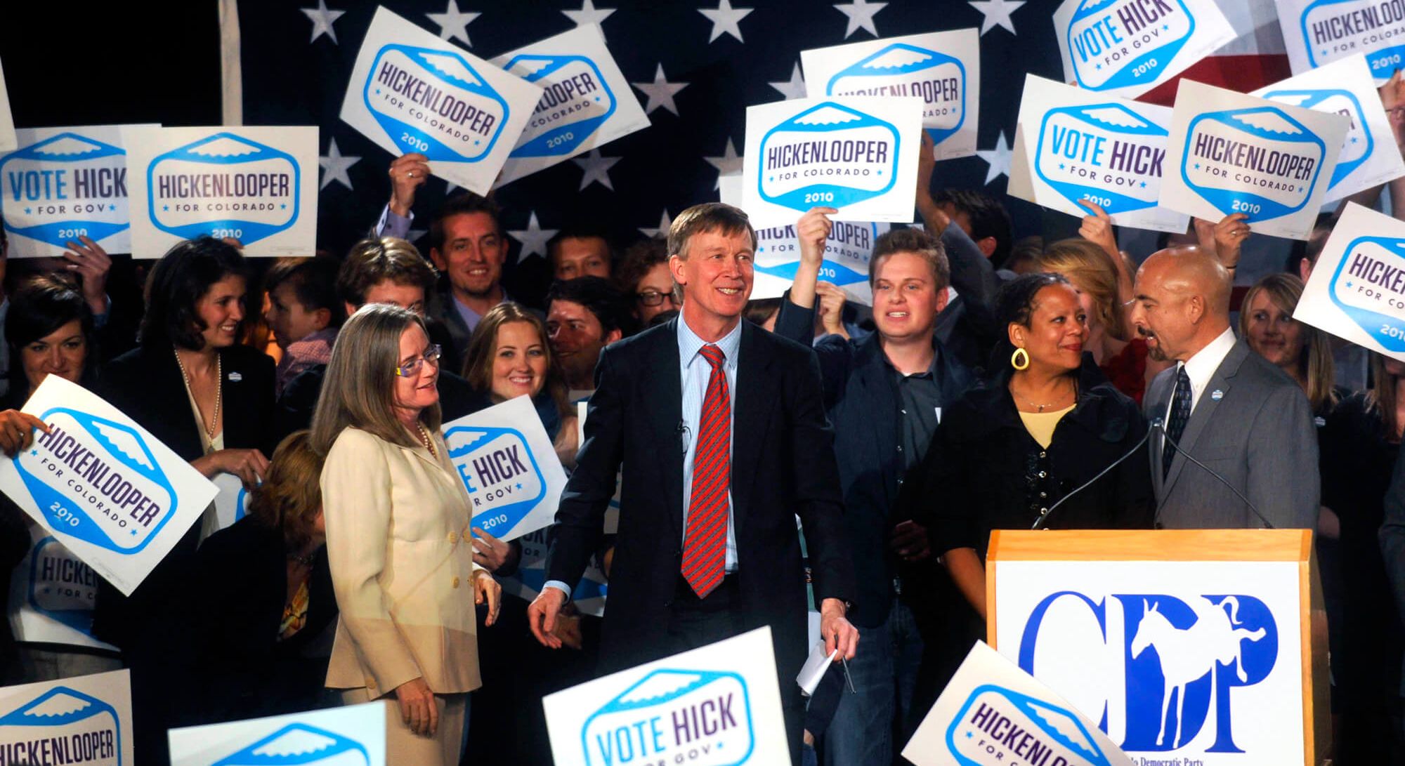 John Hickenlooper and a crowd on stage at 2010 election night victory party.