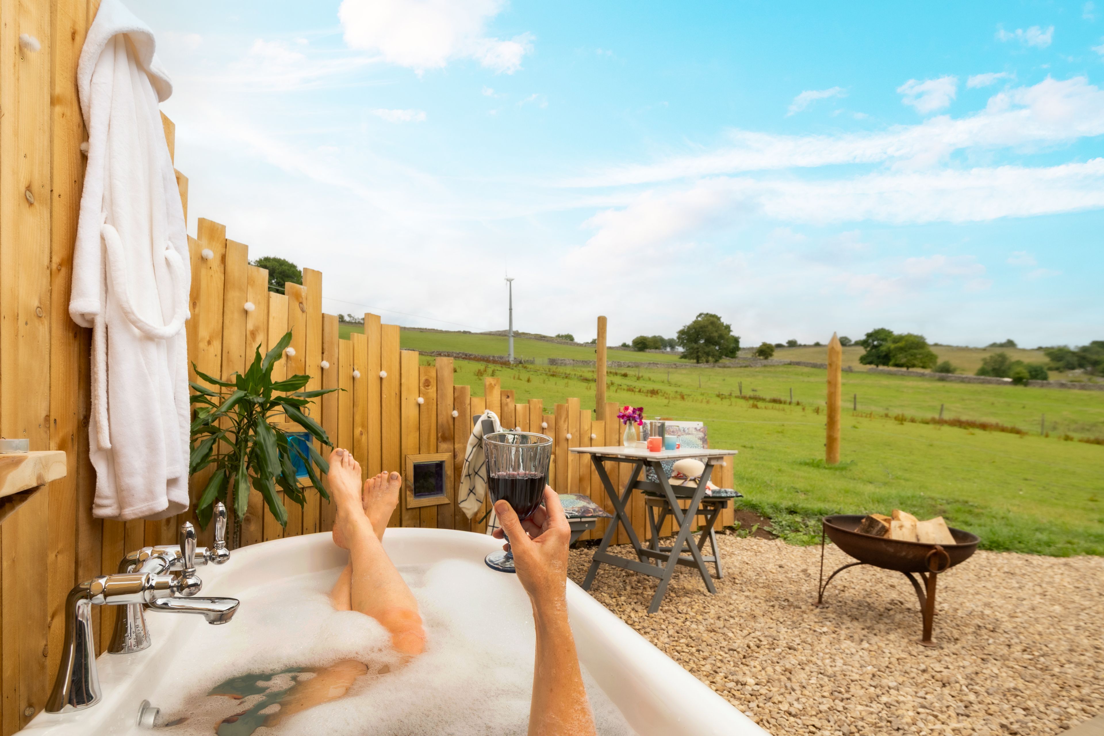 glamping pod with hot tub UK private outdoor tub