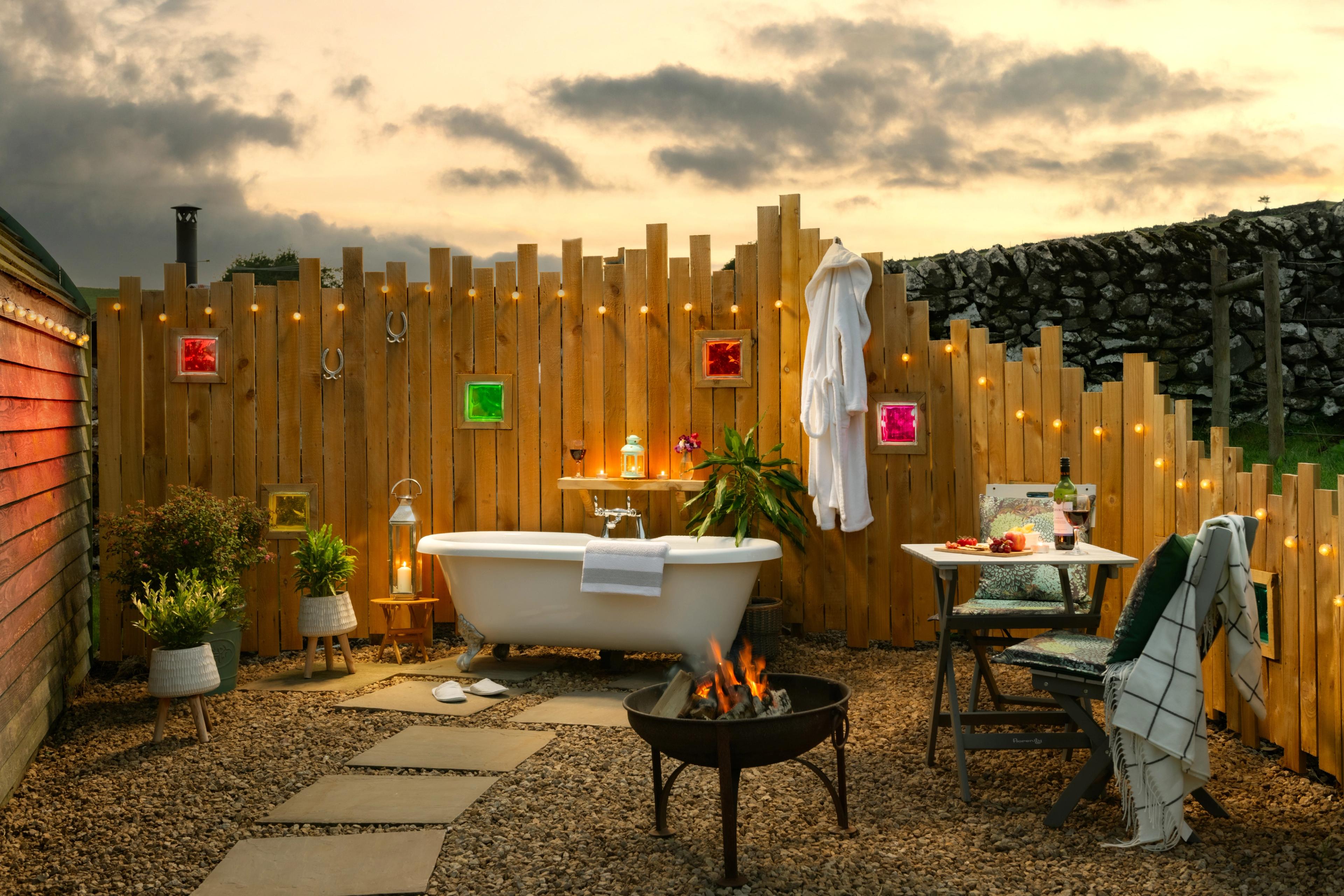 glamping pod with hot tub UK private outdoor tub