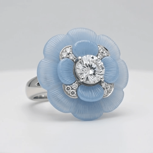 A rotating turntable animation of a flower-shaped ring