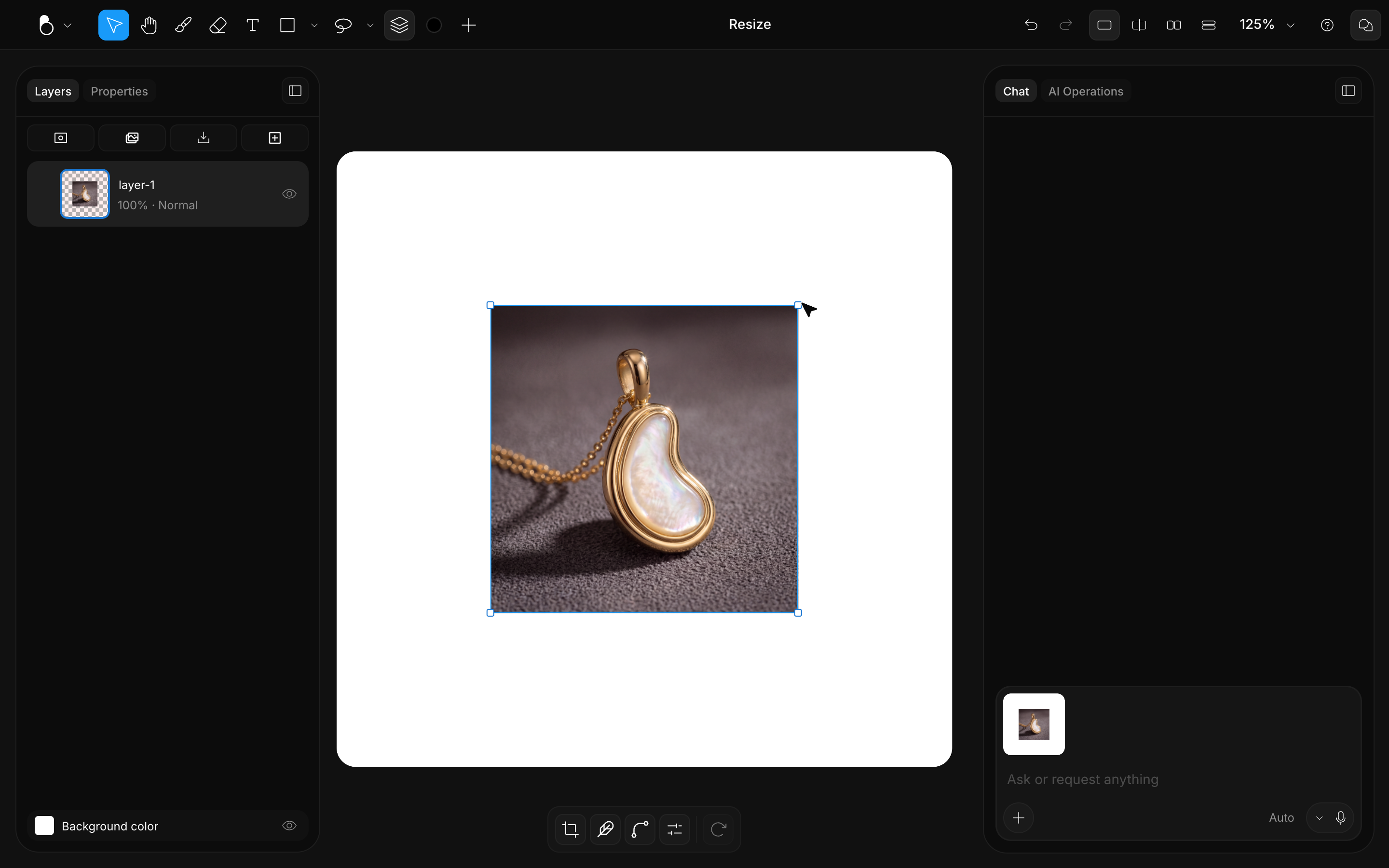 A pendant image with corner handles being resized on the canvas