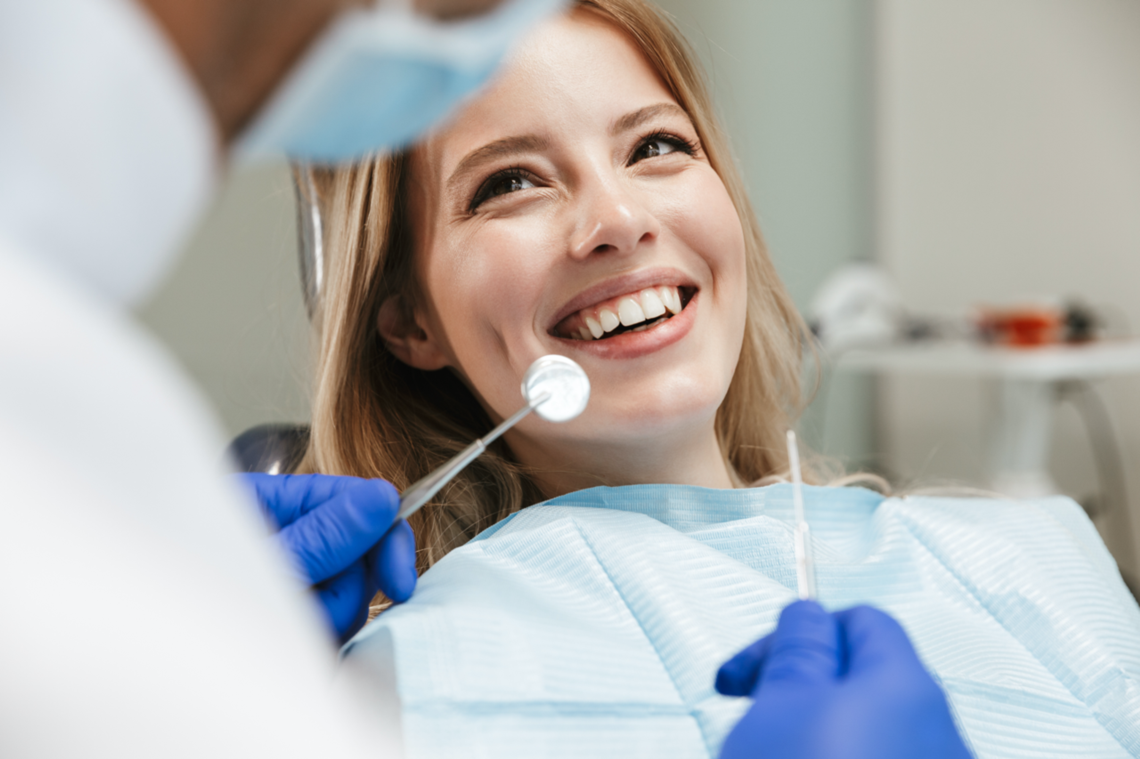 Smiling woman in a dentist chair