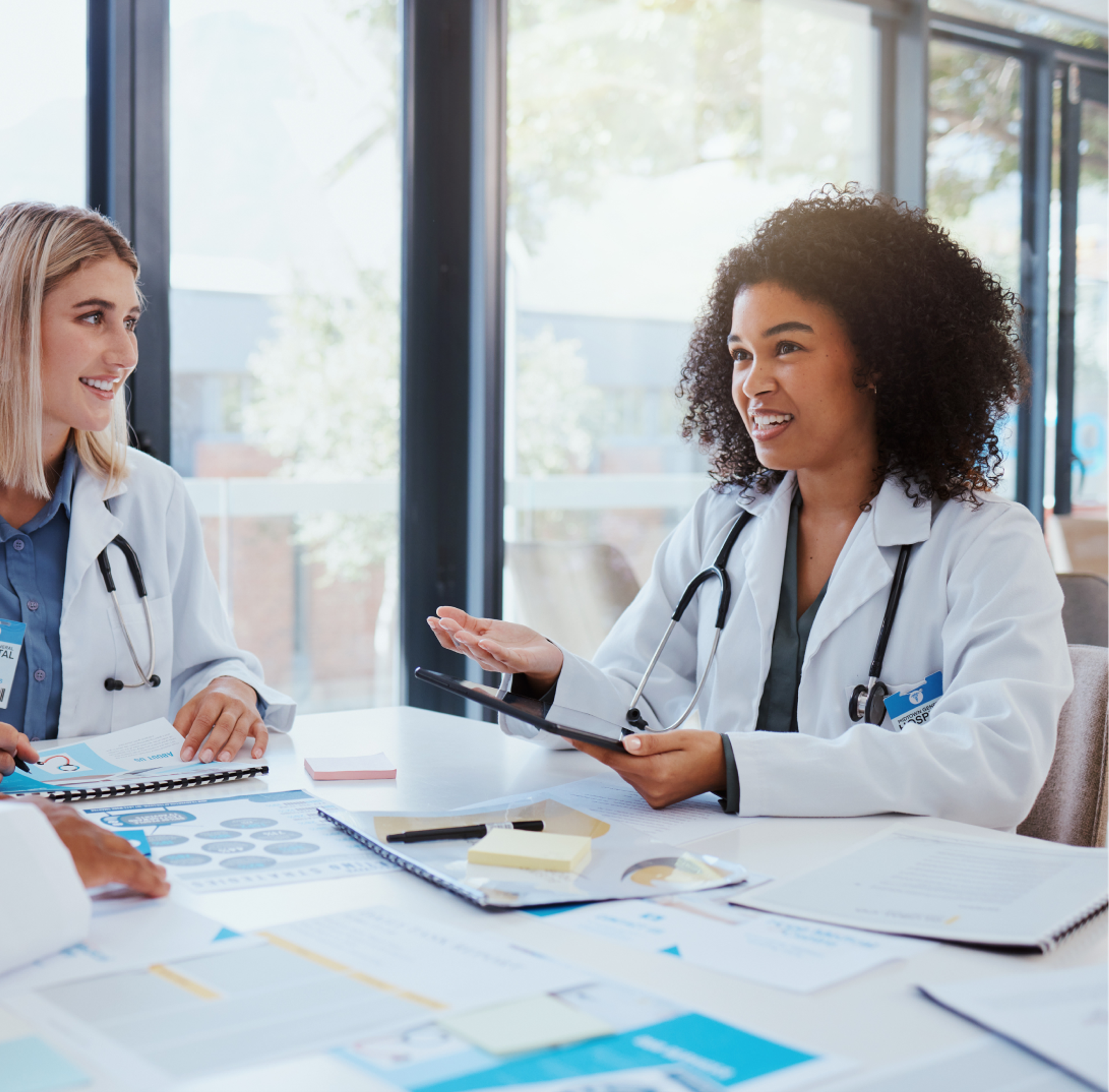 A team of doctors working on a desk