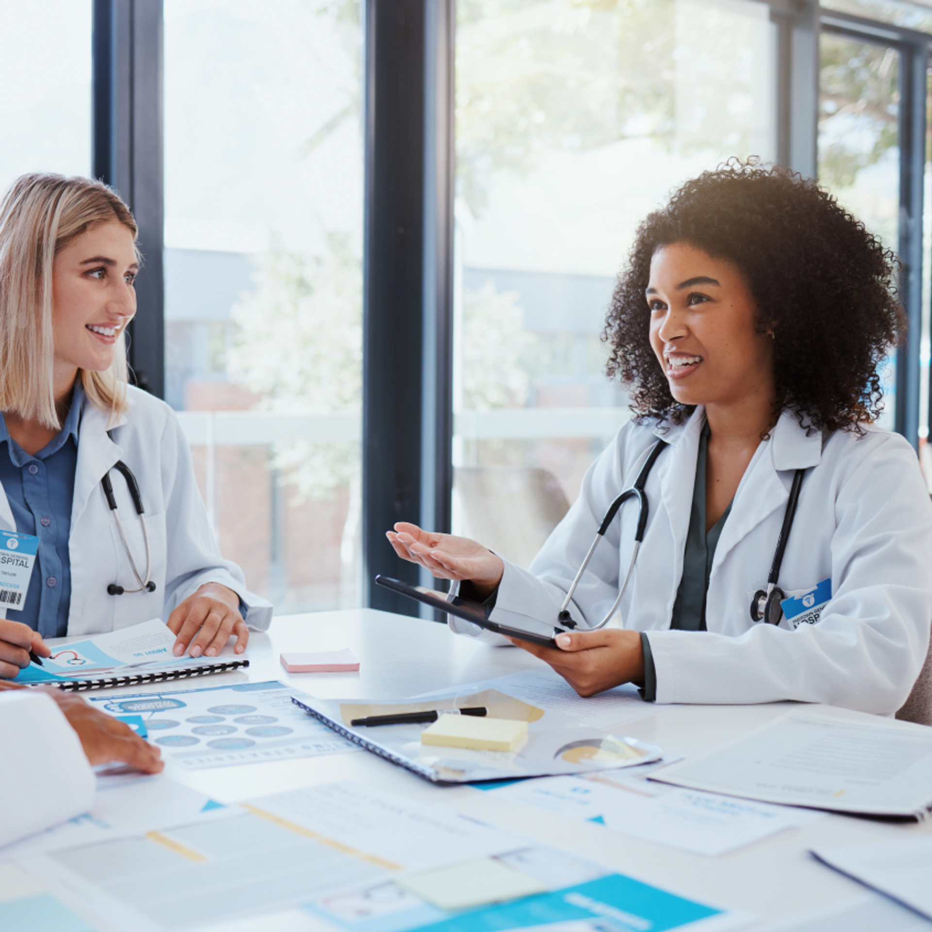 A team of doctors working on a desk