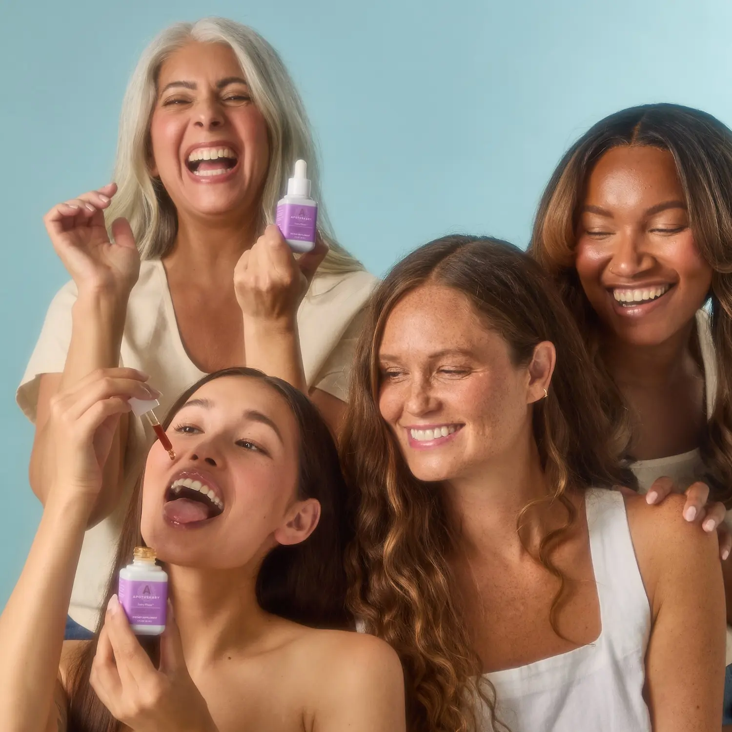 Every Phase™ photo shoot with four women. Every Phase™ is a NEW daily hormone-balancing tincture that supports mood, sleep, and cycle comfort through PMS, perimenopause, and menopause. Formulated with Pycnogenol®, it helps ease discomfort associated with hormonal changes—through every phase.*