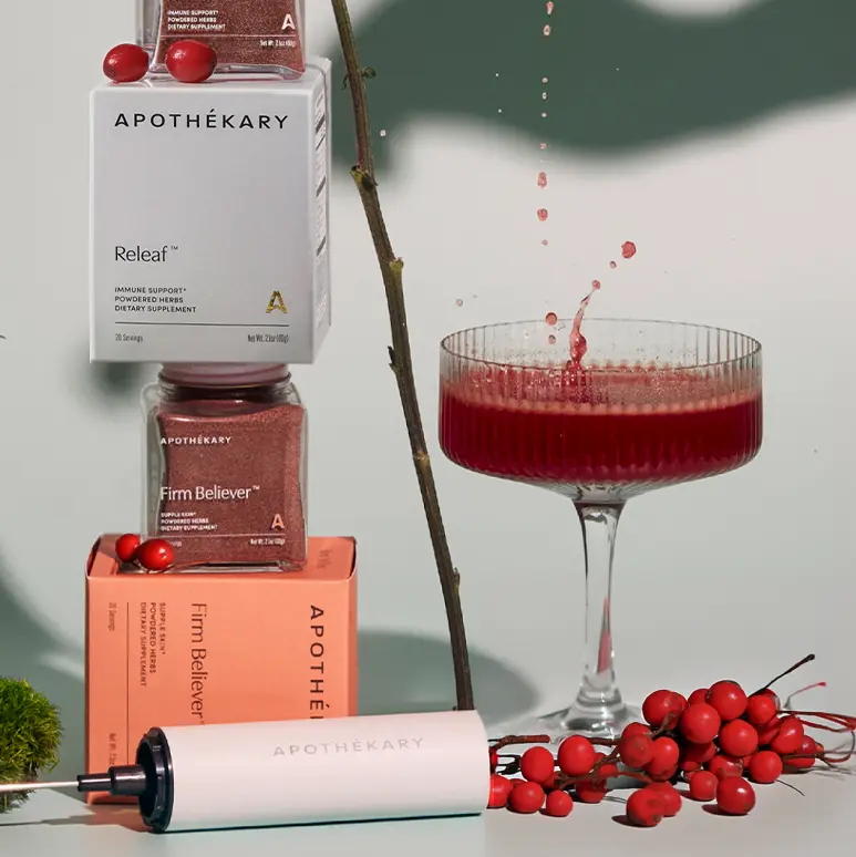 Releaf and Firm Believer next to mocktail and schisandra berries